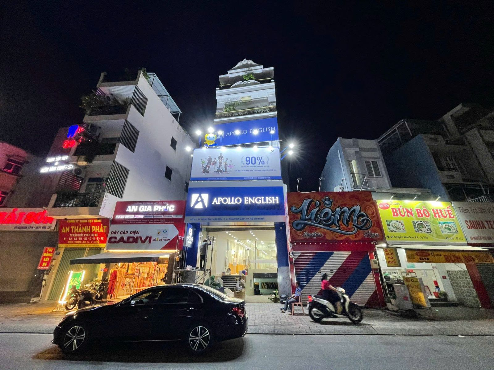 Narrow frontage with multi-level signage, Apollo English Go Vap