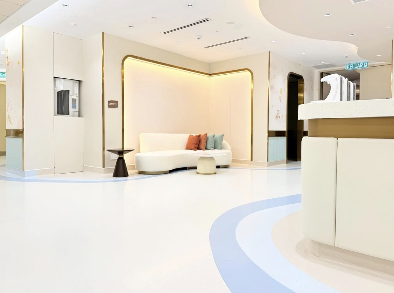 Seamless vinyl floor in a hospital waiting area with colour wayfinding strips
