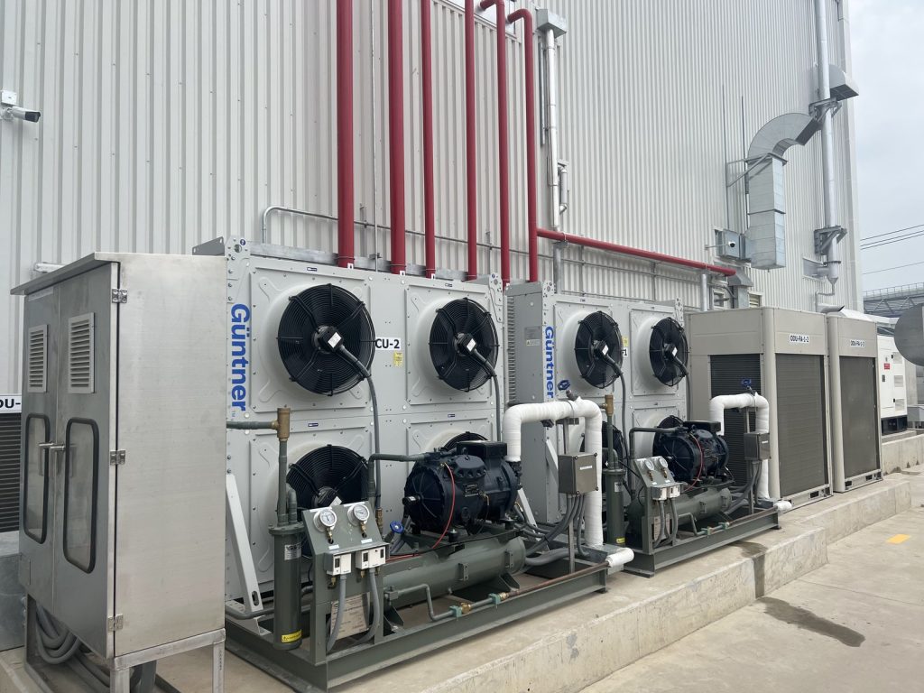 Condensing units and refrigeration equipment arranged outside the factory building