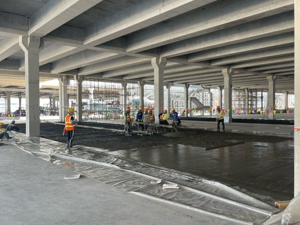 Pouring the concrete slab to the accepted levels